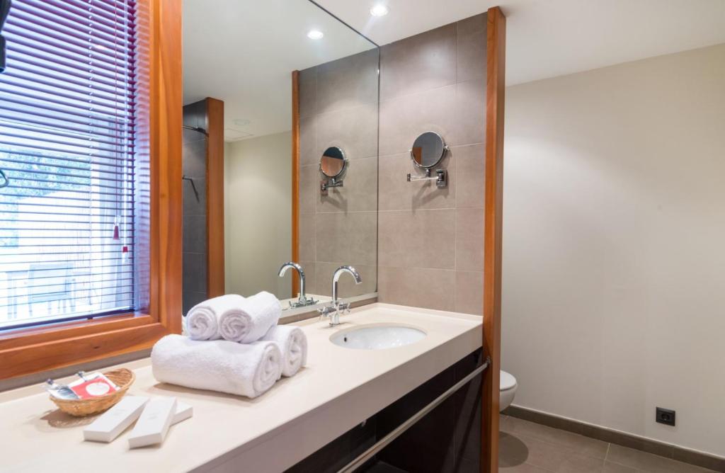 a bathroom with a sink and a shower at Mas Ses Vinyes - Adults Only in Begur
