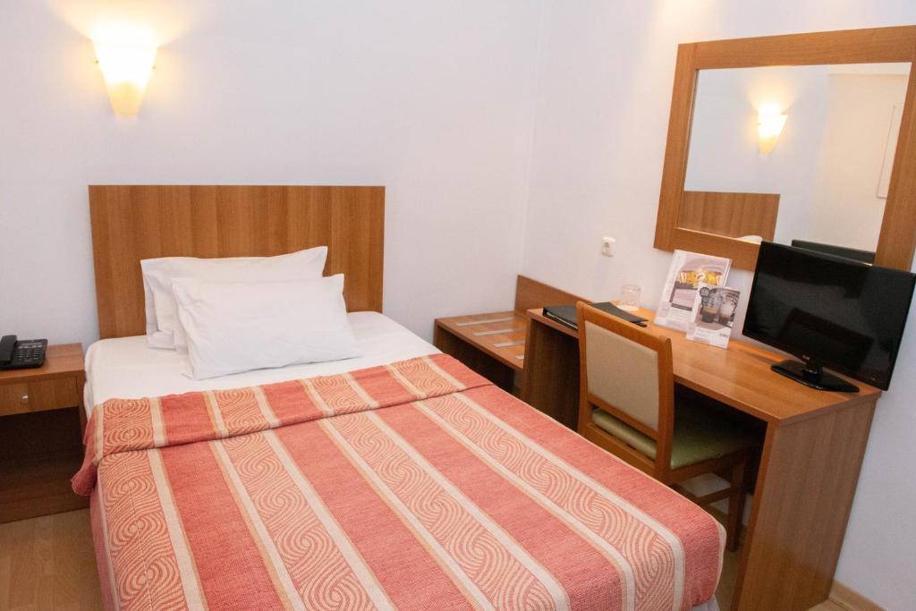 Postel nebo postele na pokoji v ubytování Leto Boutique Hotel Agrinio