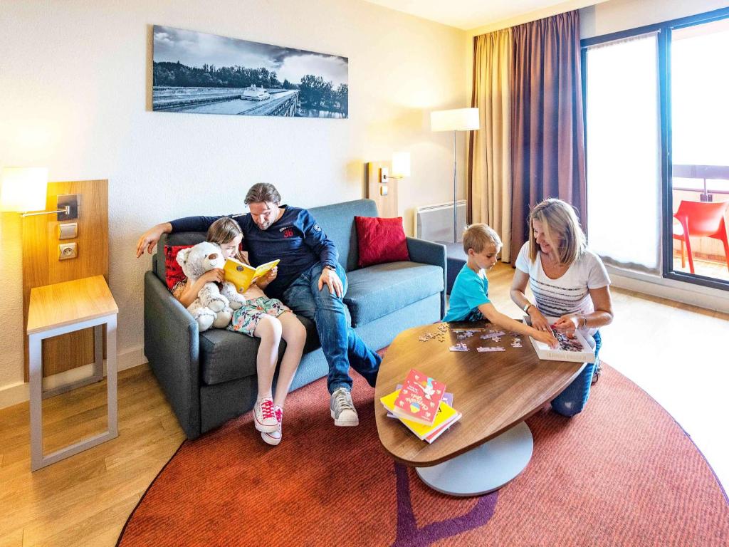 Un lugar para sentarse en Aparthotel Adagio Toulouse Centre Ramblas