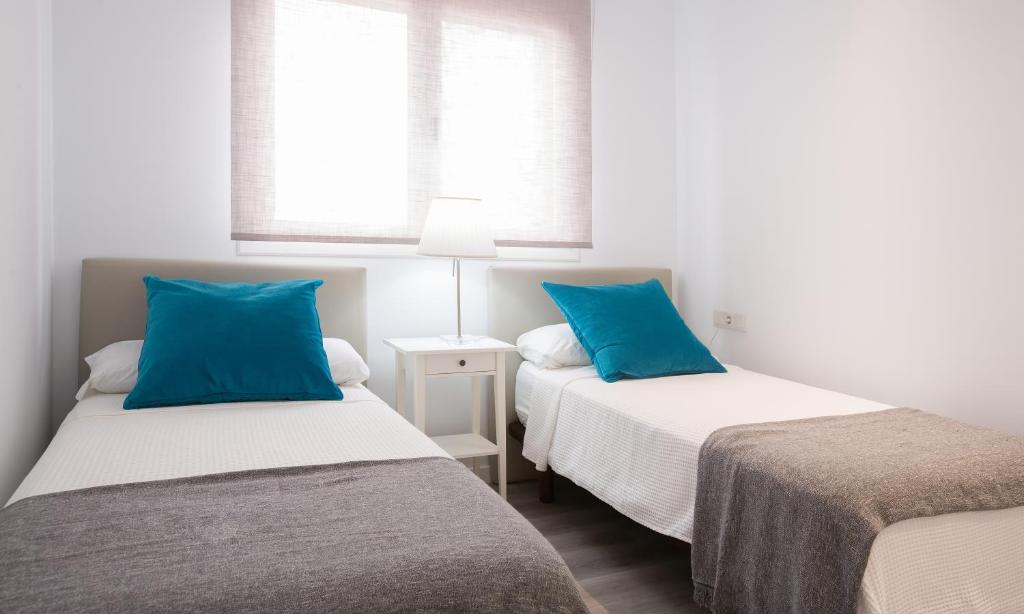 A bed or beds in a room at Hercot Canteras Relax