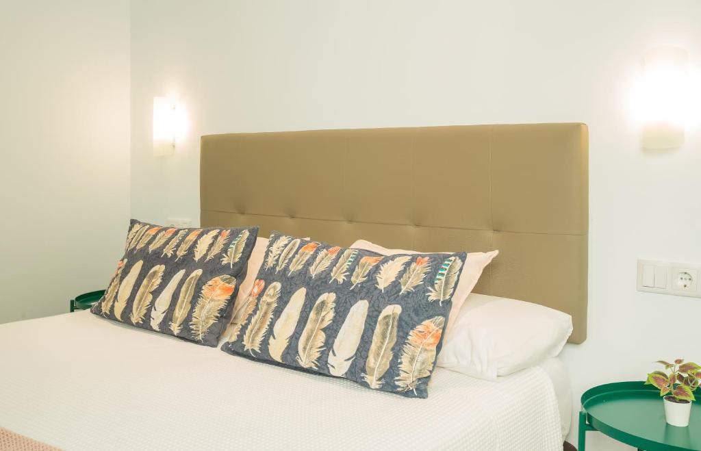 A bed or beds in a room at Hercot Canteras Relax