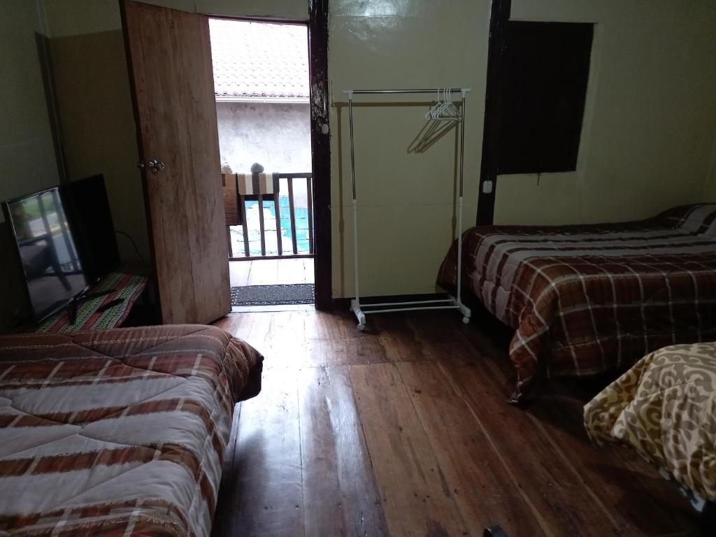 Postel nebo postele na pokoji v ubytování Montano Camping & Hostel