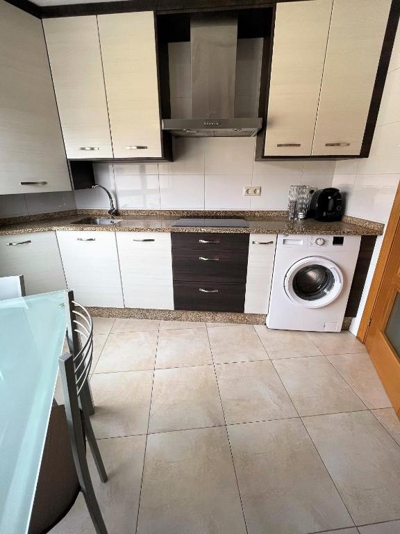 Kuchyňa alebo kuchynka v ubytovaní Apartamento Casa Lomberte
