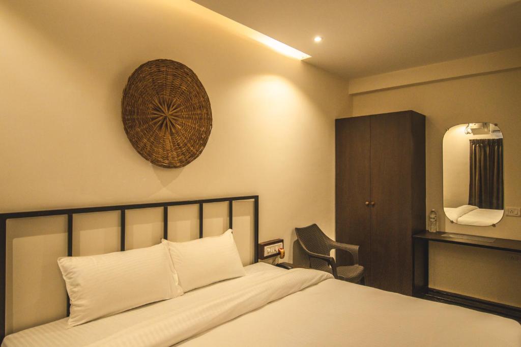 Postel nebo postele na pokoji v ubytování Amber Rooms