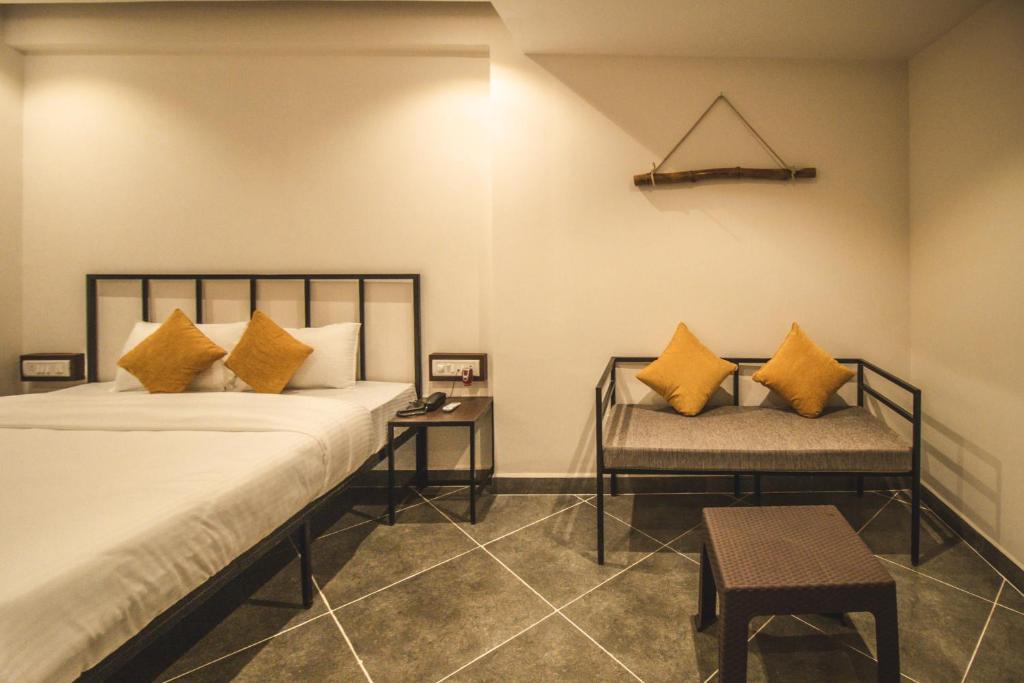 Postel nebo postele na pokoji v ubytování Amber Rooms