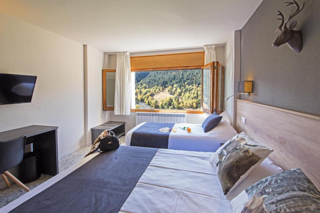 Postel nebo postele na pokoji v ubytování Hotel Austria by Pierre & Vacances