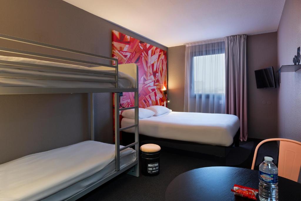 Postel nebo postele na pokoji v ubytování Ibis Styles Toulouse Centre Canal du Midi