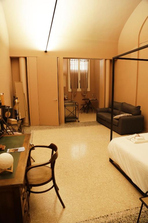 Posteľ alebo postele v izbe v ubytovaní Atelier Pallavicini Suites