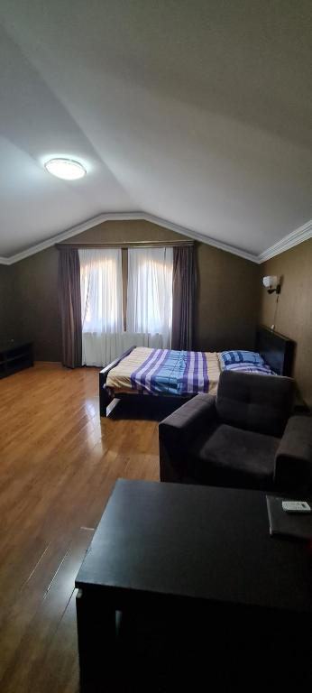 Postel nebo postele na pokoji v ubytování Hotel Emocia
