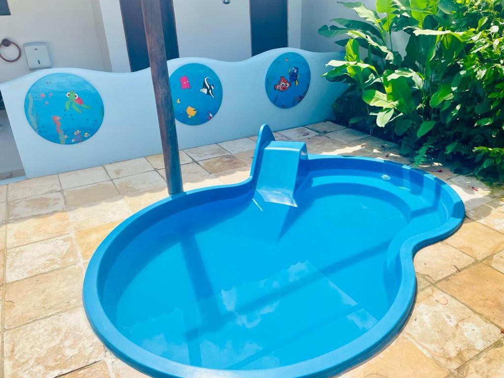 A piscina localizada em Pousada Villa Caju ou nos arredores