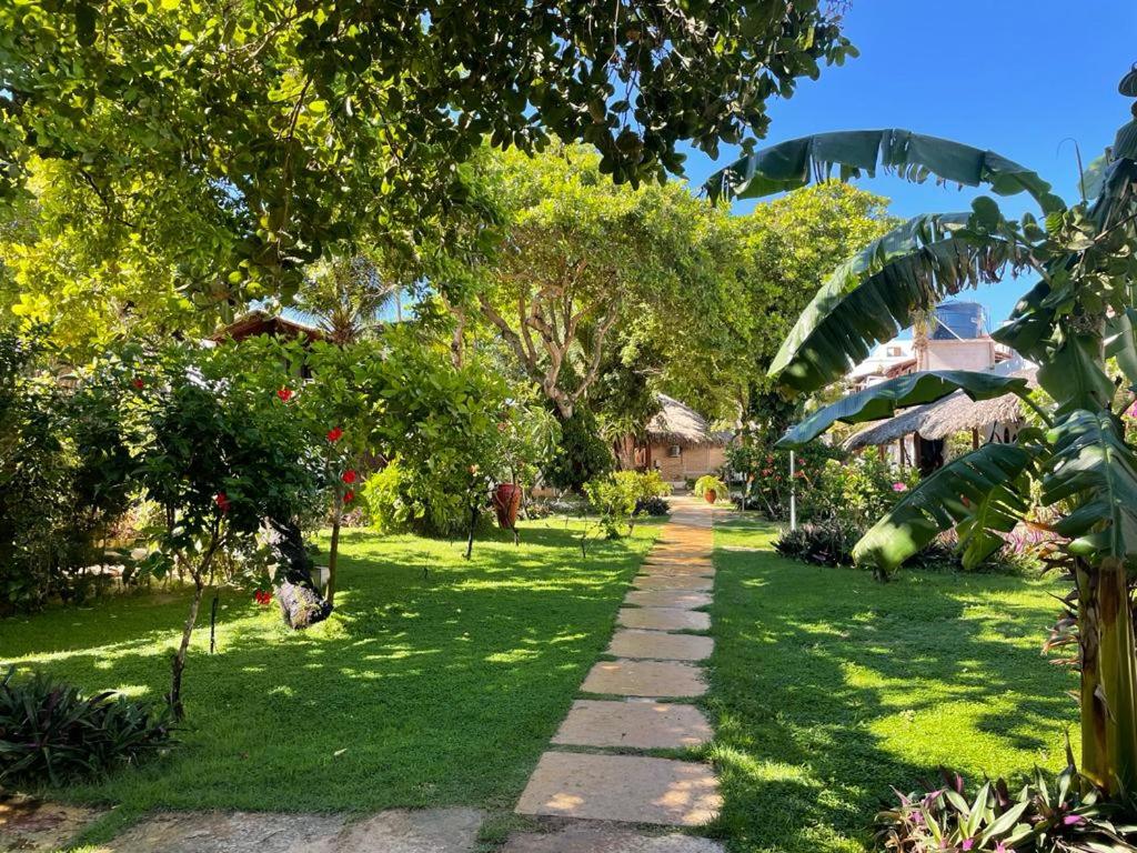 Um jardim em Pousada Villa Caju