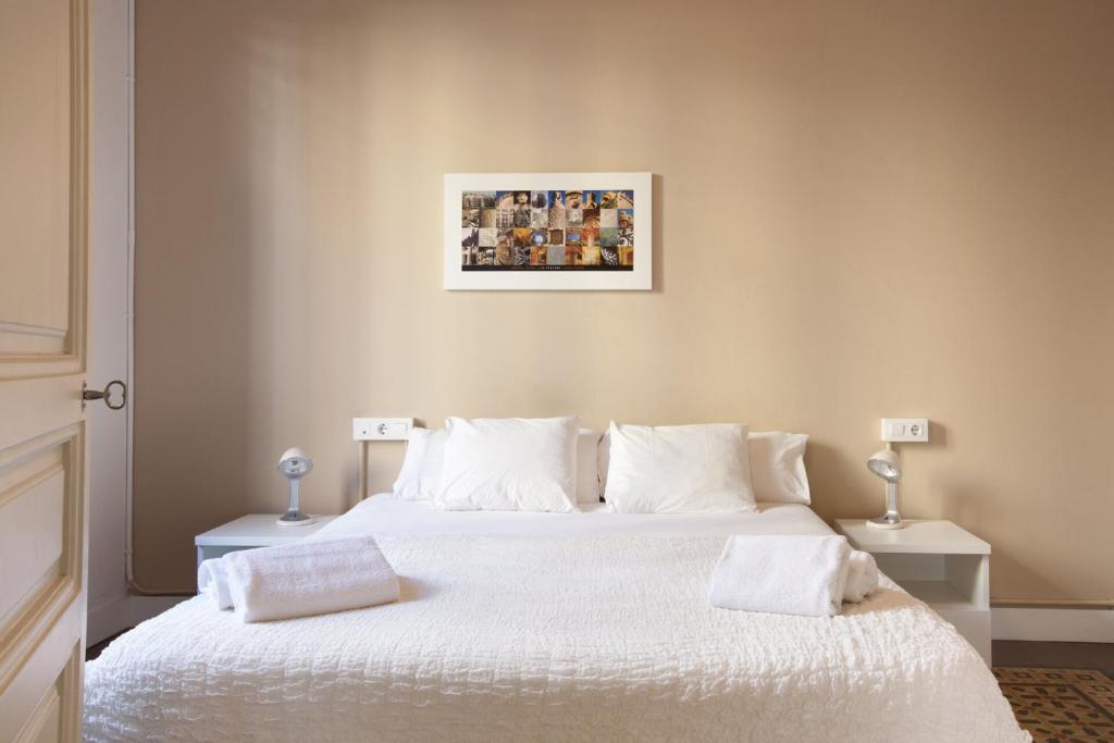 Postel nebo postele na pokoji v ubytování AB Bailen Apartments