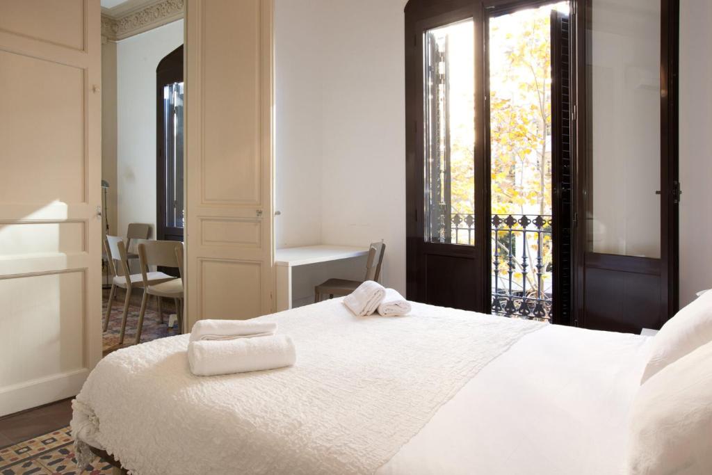 Postel nebo postele na pokoji v ubytování AB Bailen Apartments
