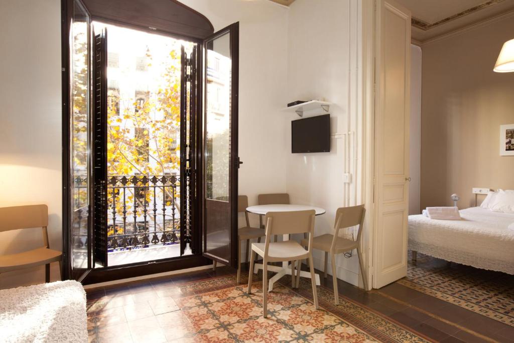 Postel nebo postele na pokoji v ubytování AB Bailen Apartments