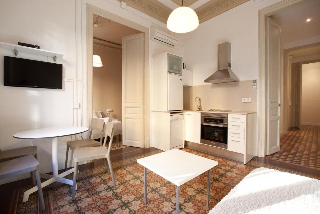 Kuchyň nebo kuchyňský kout v ubytování AB Bailen Apartments