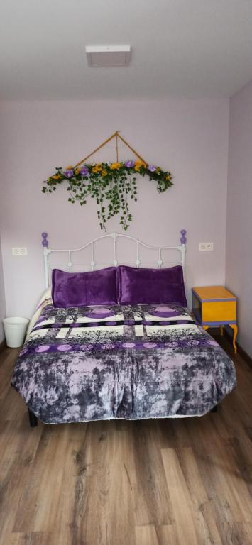 Postel nebo postele na pokoji v ubytování Apartamentos turísticos las 3 Golondrinas