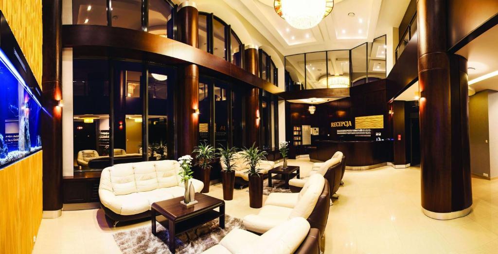TV a/nebo společenská místnost v ubytování Hotel Era