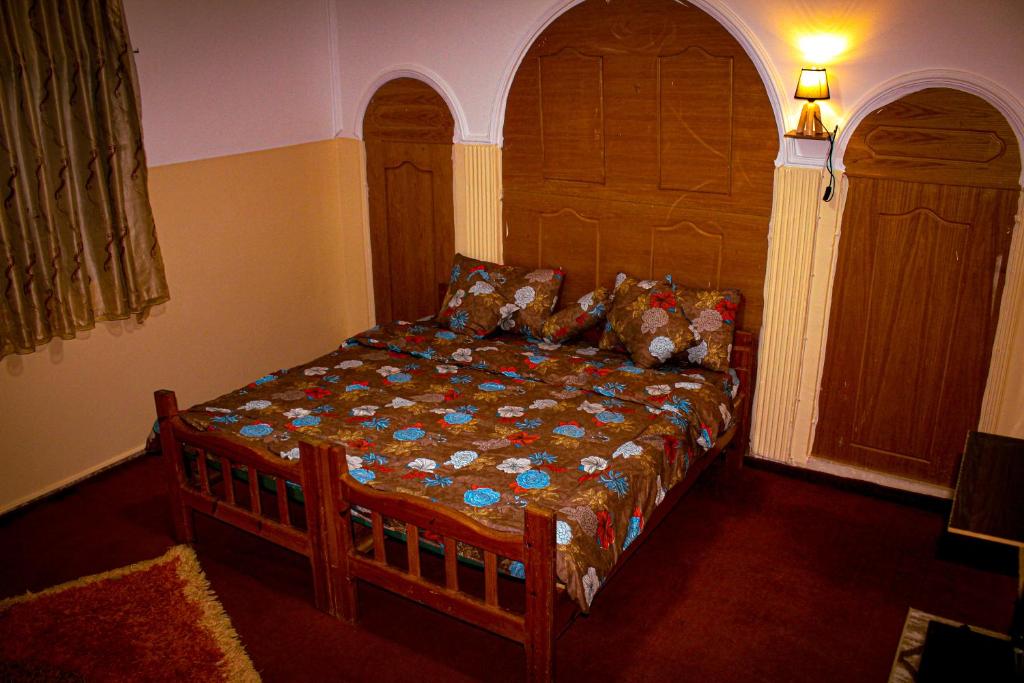 Voodi või voodid majutusasutuse Petra Peace House toas