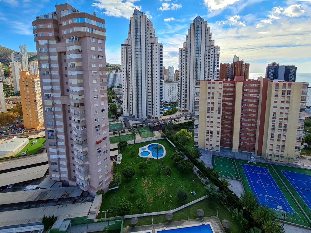 an aerial view of a city with tall buildings at Apartamento Completo Torresol IV in Benidorm