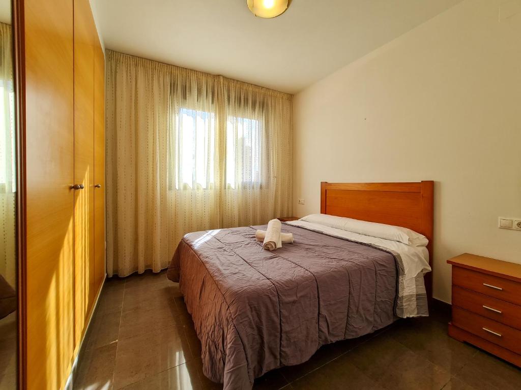 Postel nebo postele na pokoji v ubytování Apartamento Completo Torresol IV