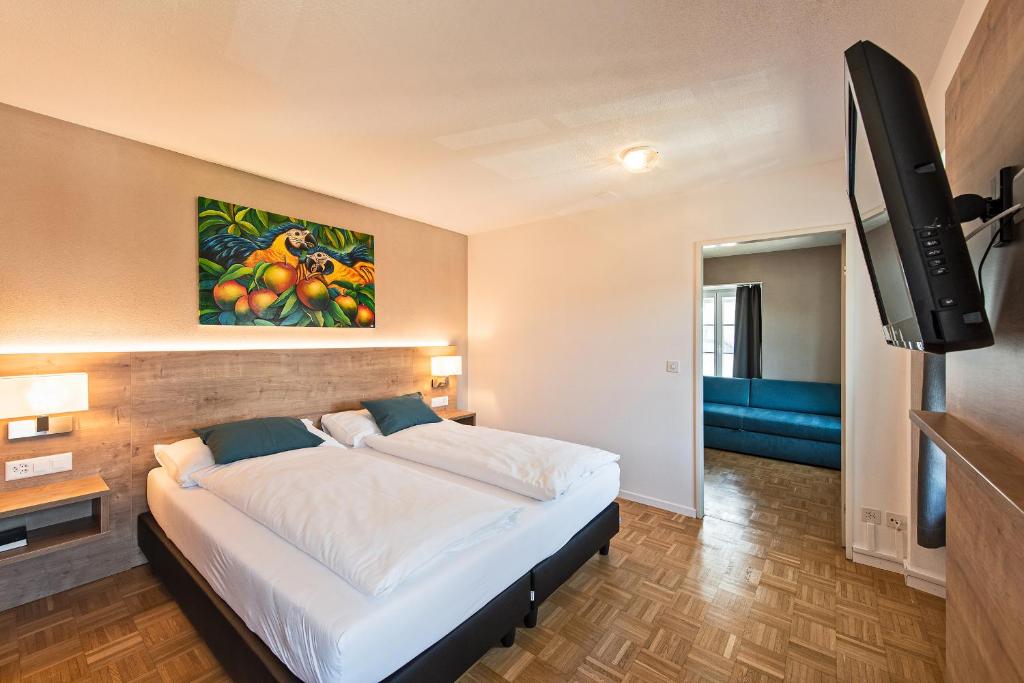 Postel nebo postele na pokoji v ubytování Hotel zum Hirschen