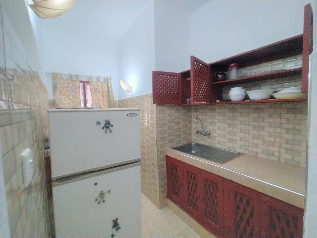 Kuchyň nebo kuchyňský kout v ubytování Karibuni Jeds Villas 85 & 86