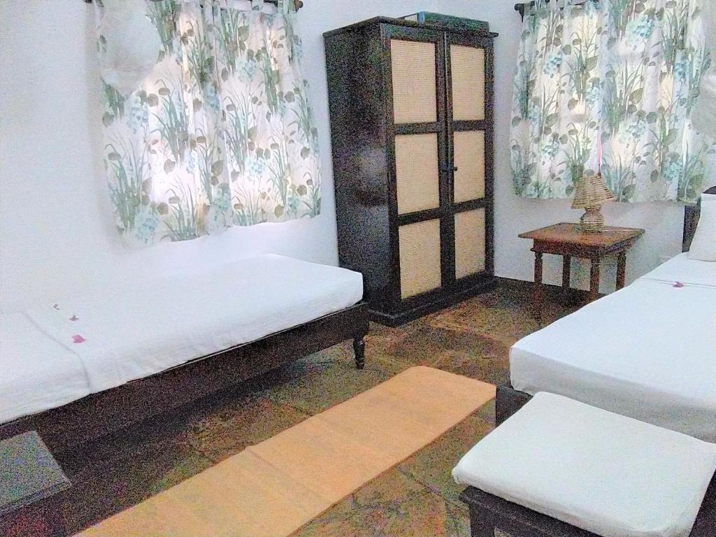 Postel nebo postele na pokoji v ubytování Karibuni Jeds Villas 85 & 86