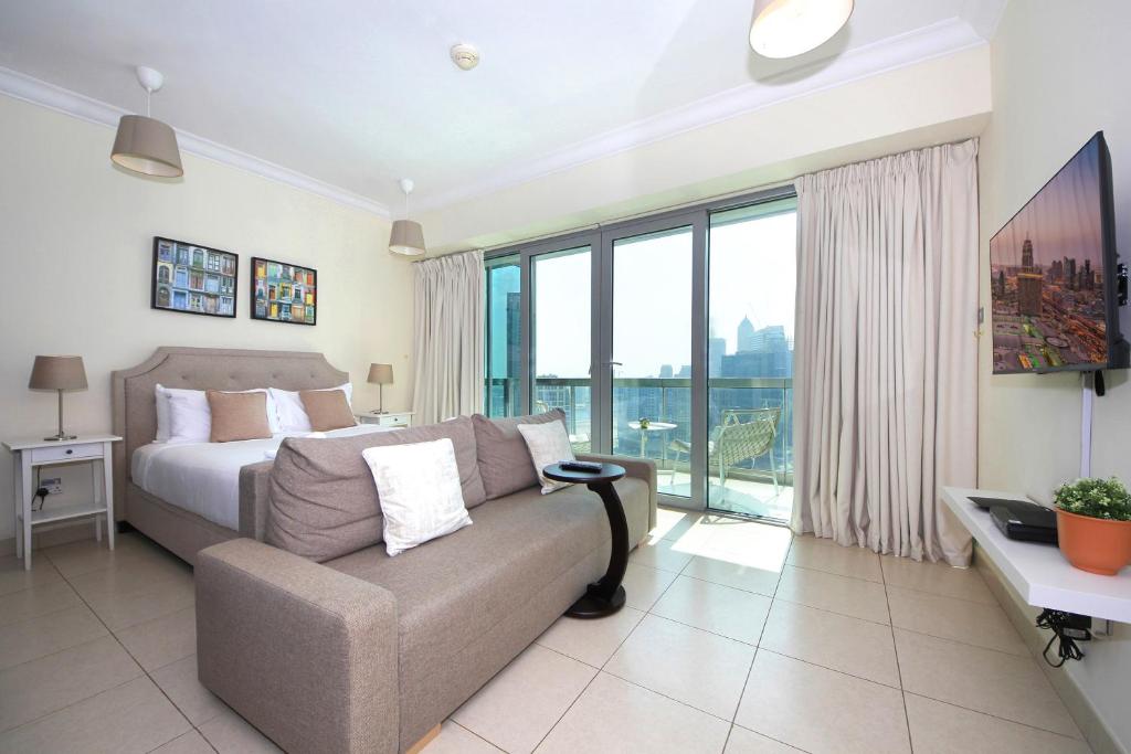 Postel nebo postele na pokoji v ubytování Prime Retreats - Downtown Dubai