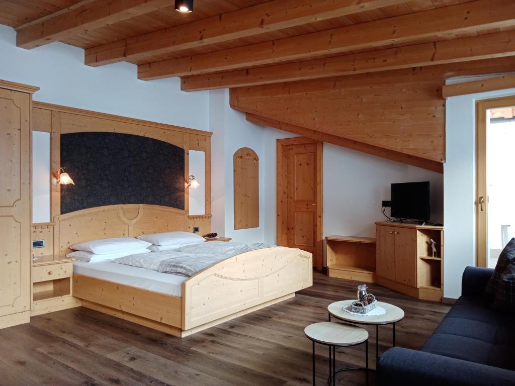 Postel nebo postele na pokoji v ubytování Hotel Garni Walter