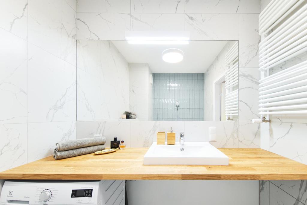 Kuchyňa alebo kuchynka v ubytovaní Apartament Nadmotławski Sen