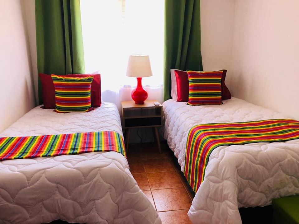 Posteľ alebo postele v izbe v ubytovaní Valle Dorado 9
