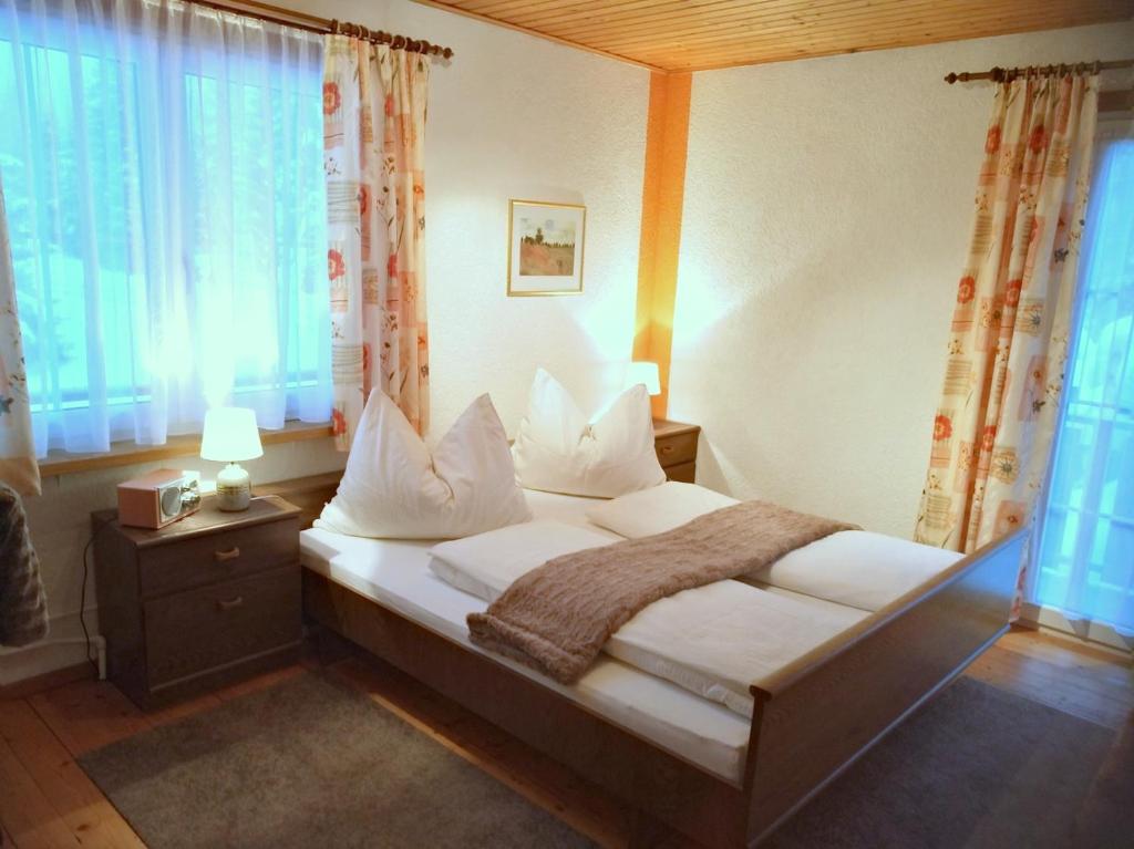 Postel nebo postele na pokoji v ubytování Appartment Sandra Obkircher