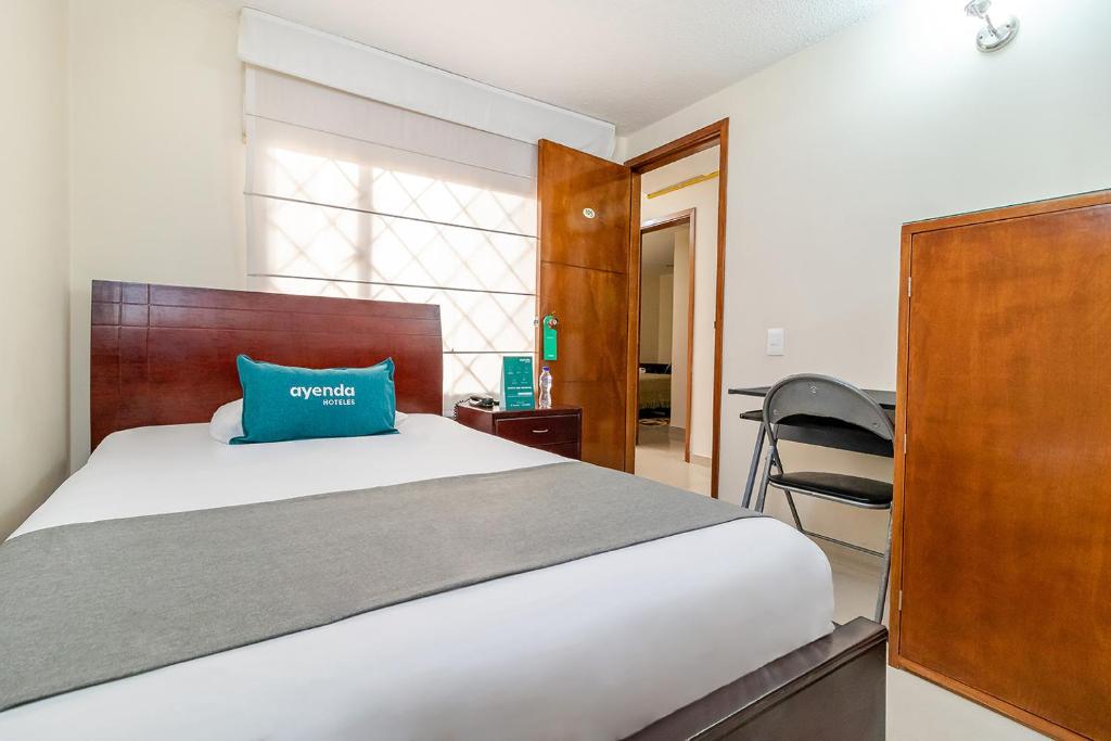 Postel nebo postele na pokoji v ubytování Hotel Nabusimake Modelia