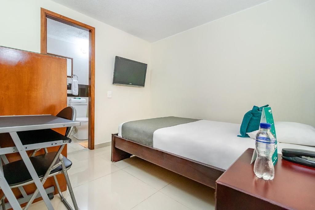 Postel nebo postele na pokoji v ubytování Hotel Nabusimake Modelia