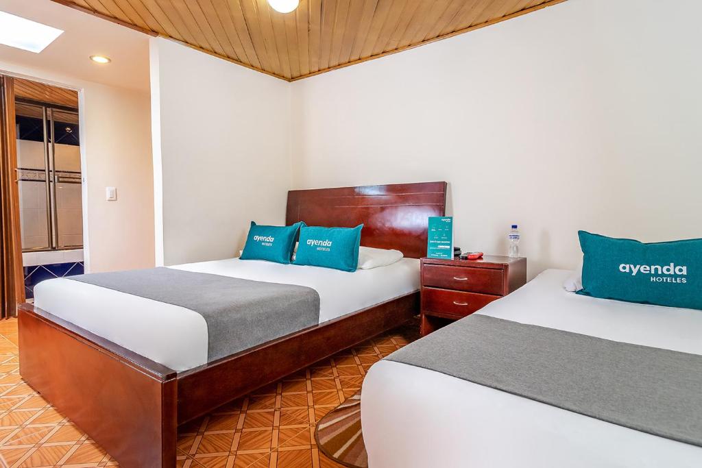 Postel nebo postele na pokoji v ubytování Hotel Nabusimake Modelia