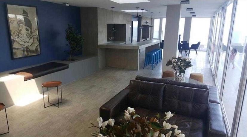 TV a/nebo společenská místnost v ubytování Tantum Concon Apartment