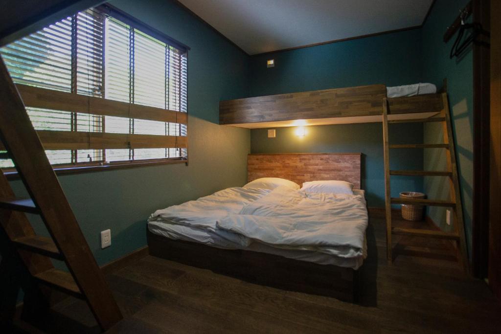 Postel nebo postele na pokoji v ubytování Lodge Hahnenkamm