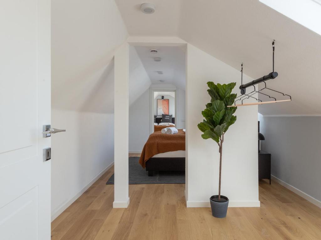 Postel nebo postele na pokoji v ubytování limehome Baden-Baden Bäderstraße