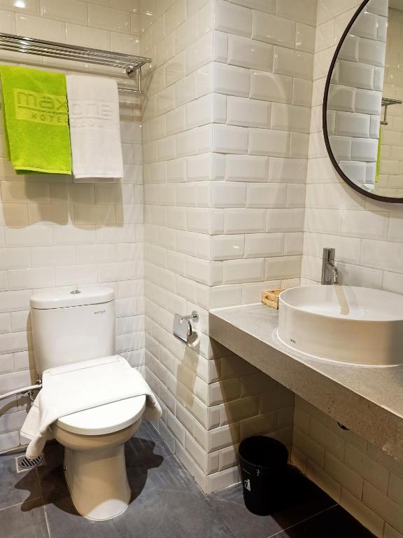 Koupelna v ubytování MaxOneHotels Loji Kridanggo @Boyolali