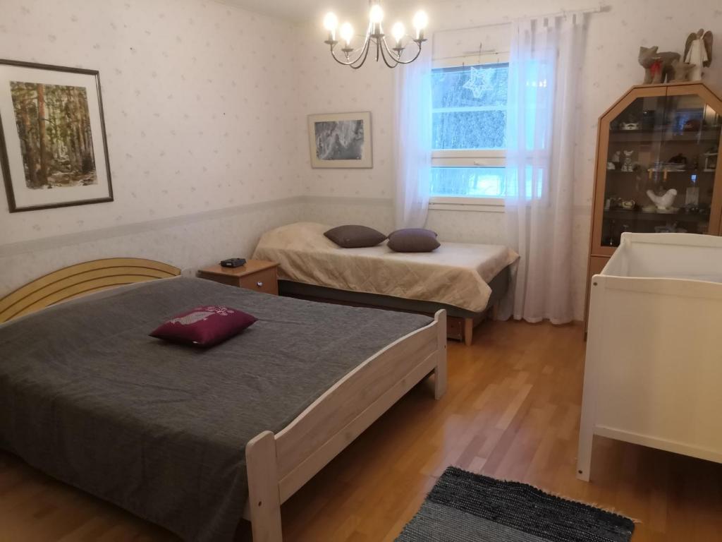 Vuode tai vuoteita majoituspaikassa Jalasjärvi Apartment