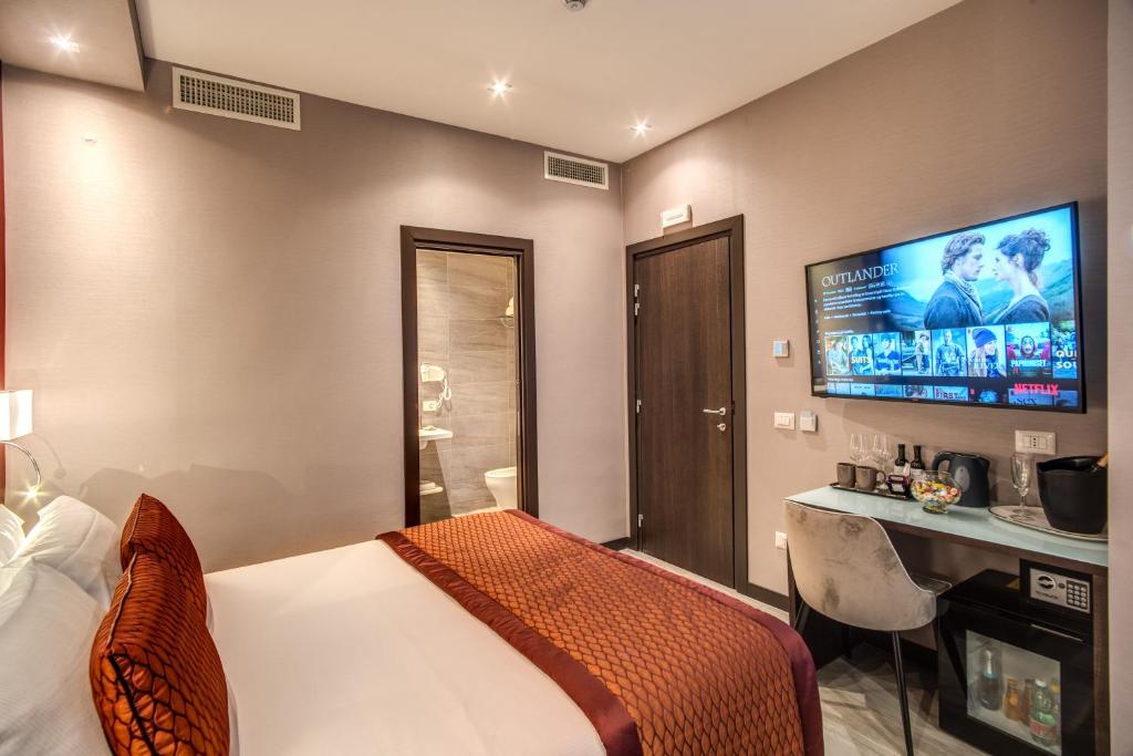 TV a/nebo společenská místnost v ubytování MZ HOTEL