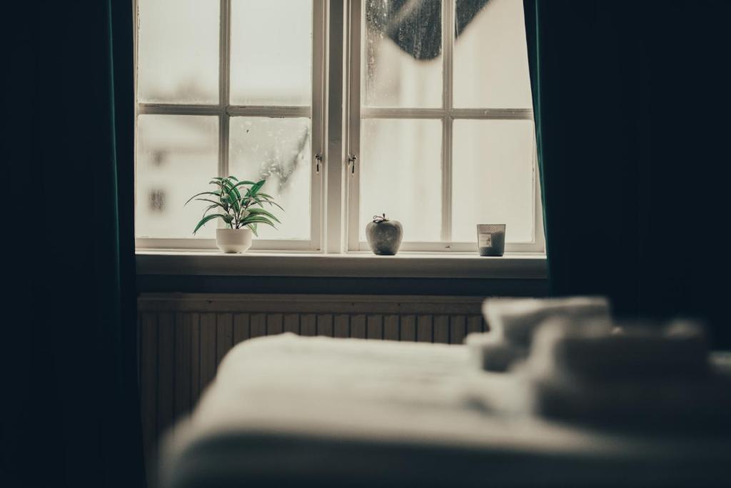 Postel nebo postele na pokoji v ubytování STF Gysinge Wärdshus & Hotell