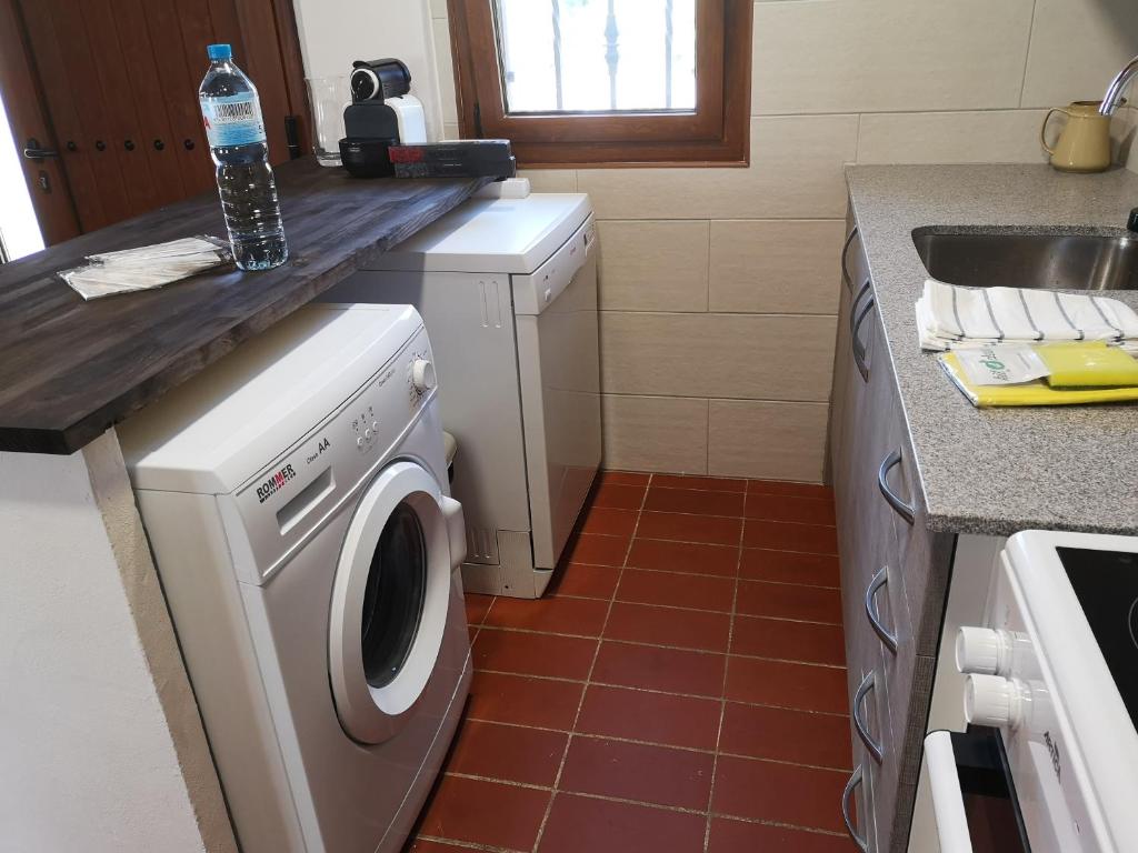 A kitchen or kitchenette at LLOGUER30 La Rajoleria para desconectar