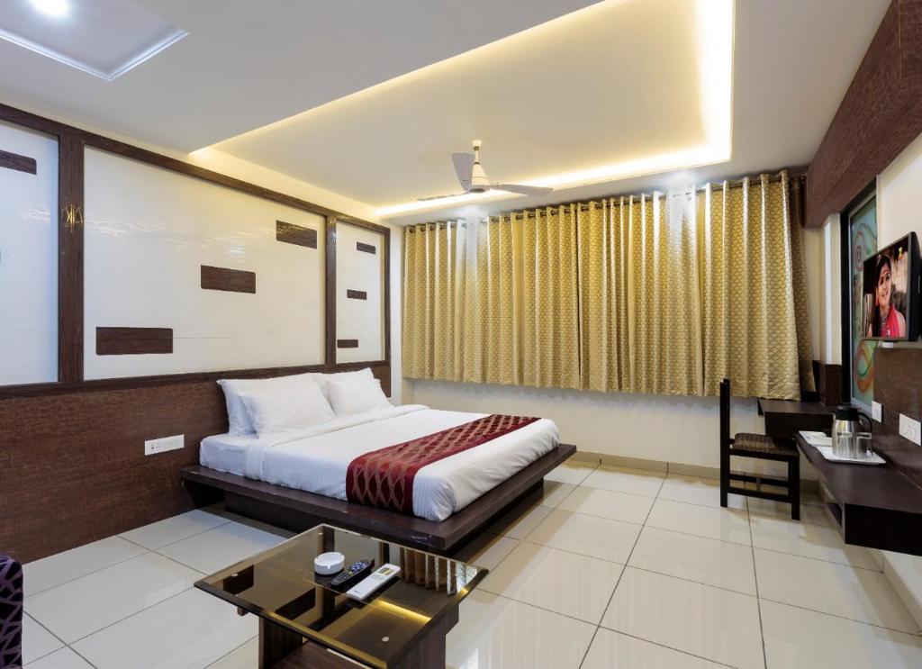 Postel nebo postele na pokoji v ubytování Hotel Radiant