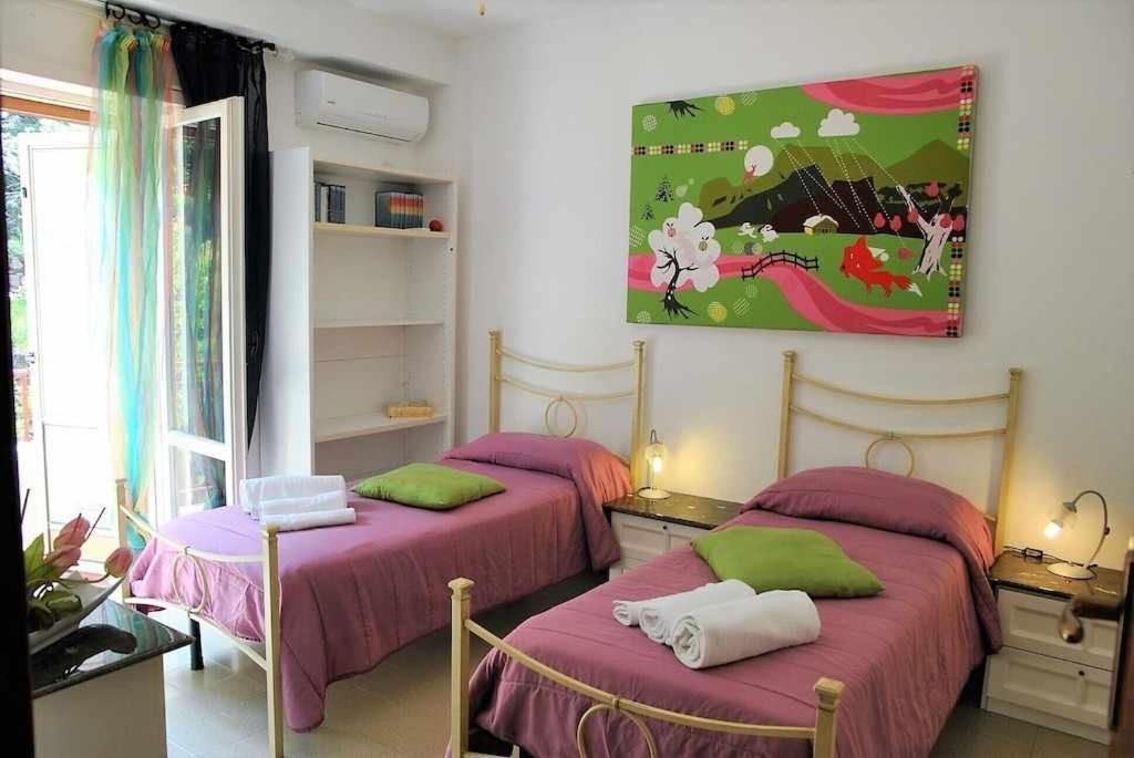 Postel nebo postele na pokoji v ubytování VILLA LINA a 500 mt dal mare