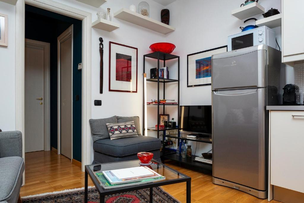Televízia a/alebo spoločenská miestnosť v ubytovaní Nolo Apartment 2