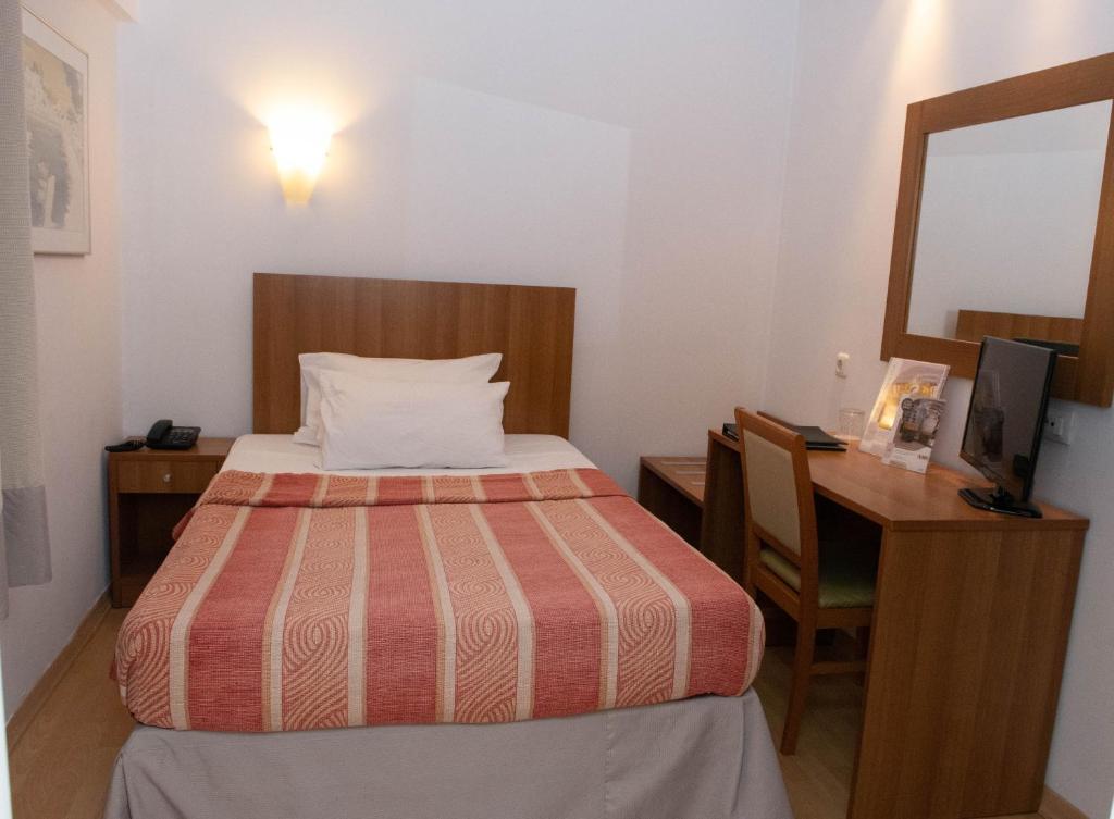 Postel nebo postele na pokoji v ubytování Leto Boutique Hotel Agrinio