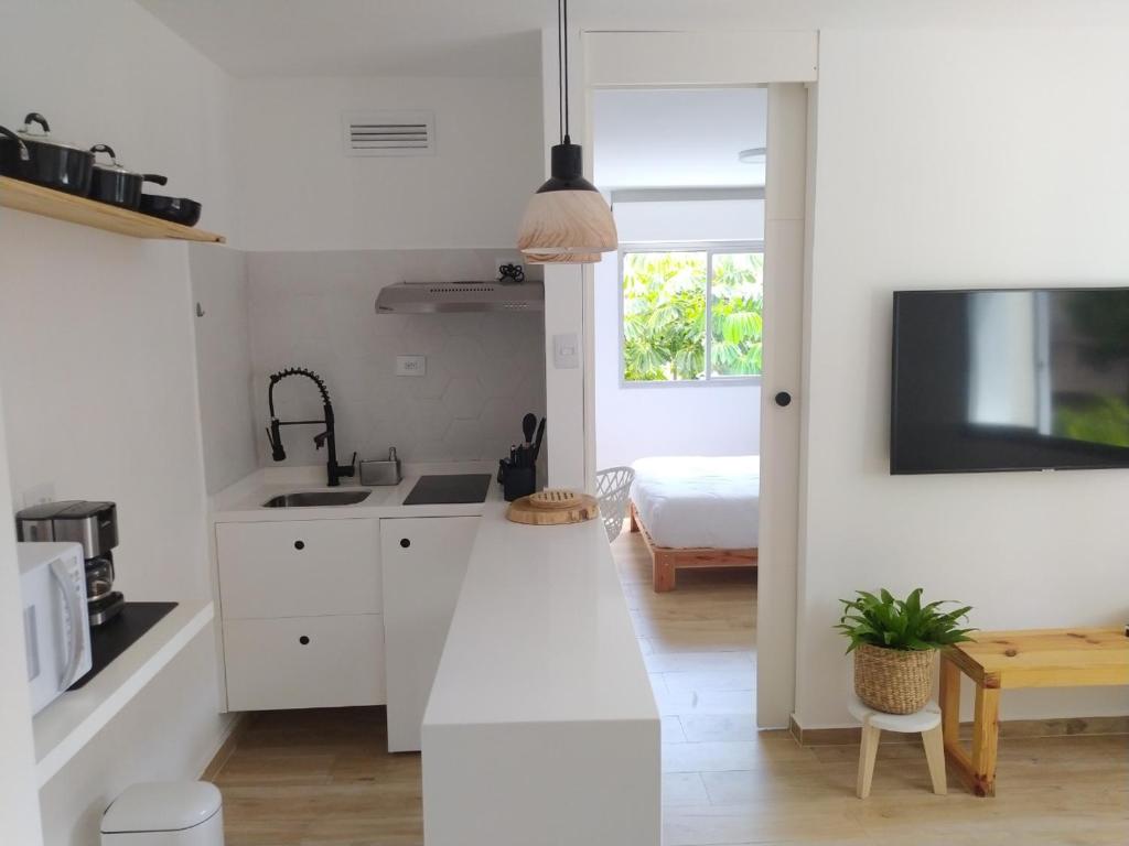 Kuchyň nebo kuchyňský kout v ubytování Paulista Flat Hotel