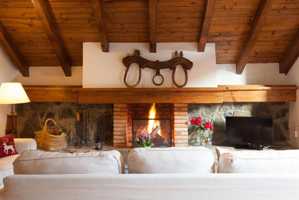 Posezení v ubytování Tarter Chalets Apartaments