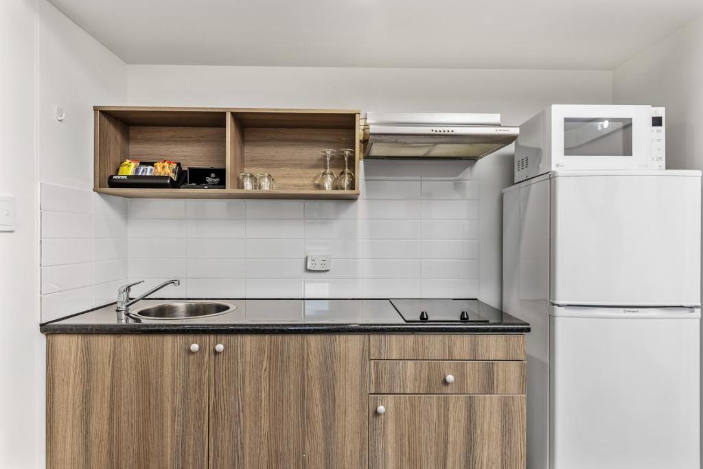 Kuchyň nebo kuchyňský kout v ubytování Novotel Darwin CBD